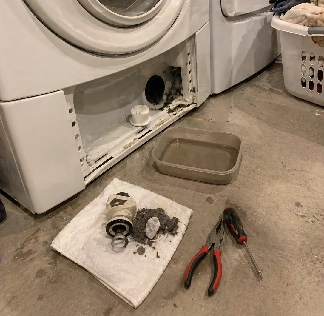 cleaned clogged drain pump filter